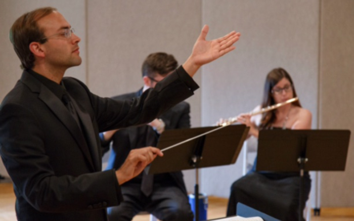 conductor performing conducting etudes